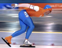 Netherlands' Uytdehaage wins 10,000-m speed skating